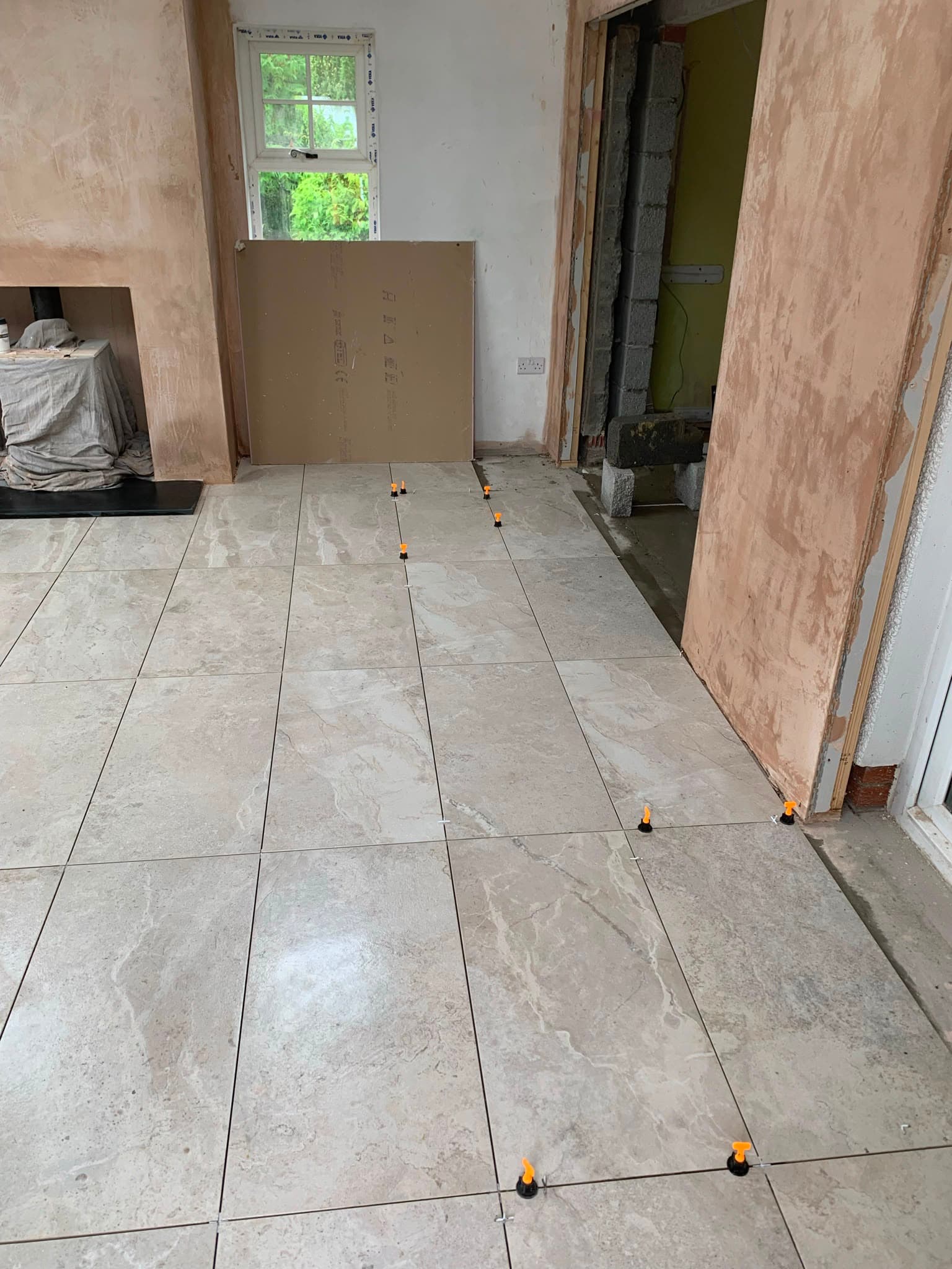 Floor tiling in progress by WMC Property Maintenance